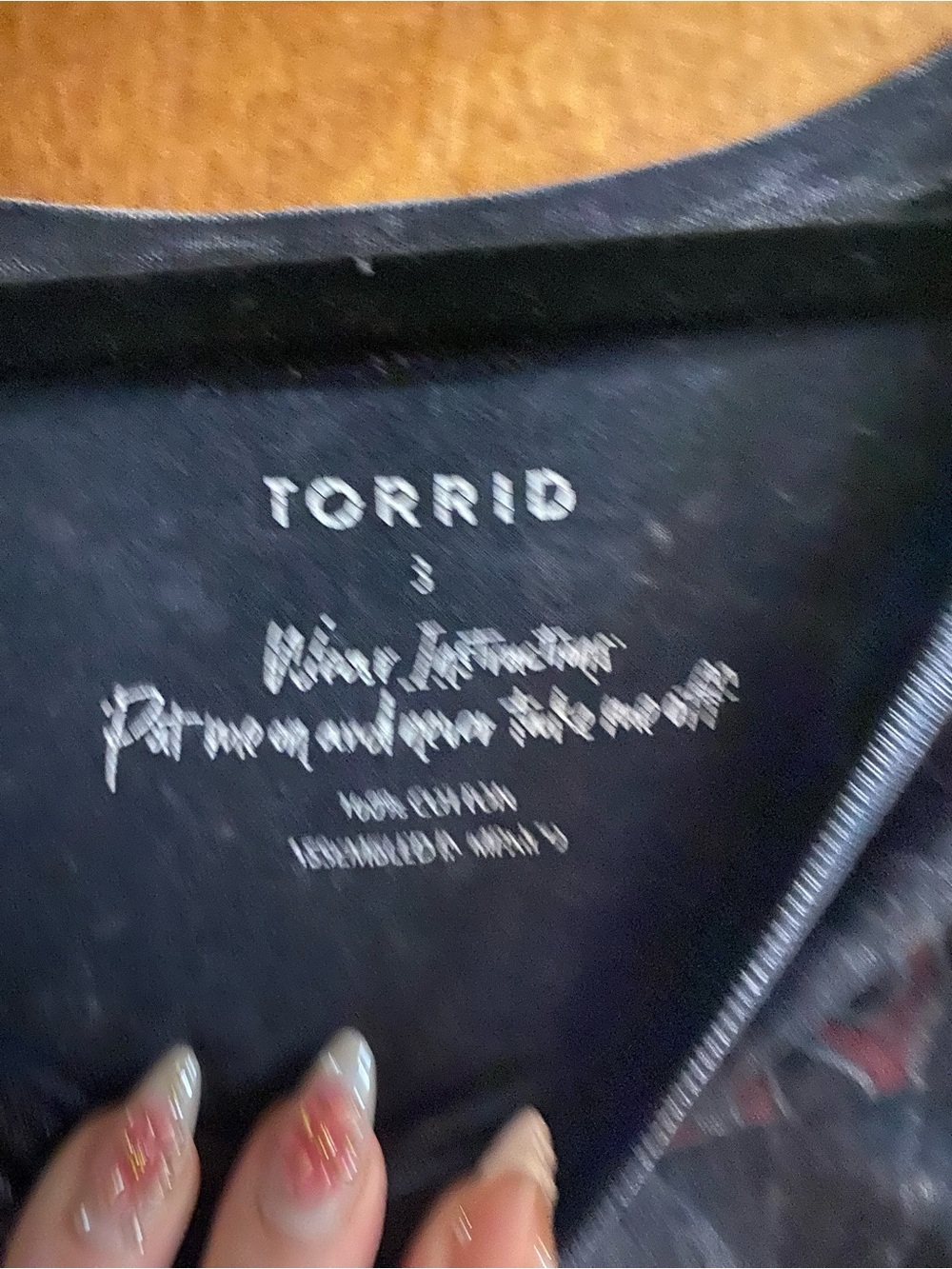 torrid Black Graphic Tee with Subtle Red Accents - Picture 2 of 3